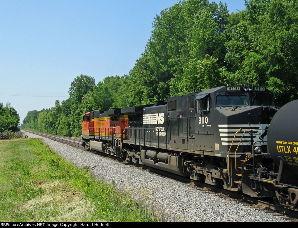 NS 9110 trails a BNSF unit southbound at Five Row